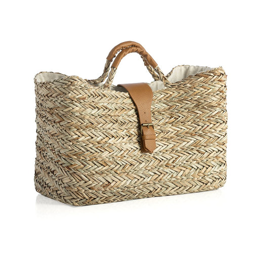 side view of seagrass tote on white background.