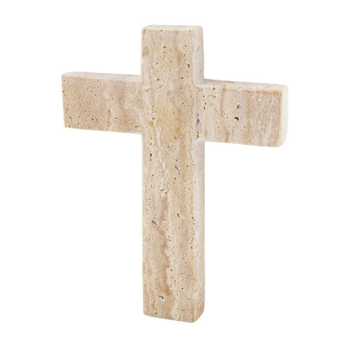 cream travertine cross on a white background