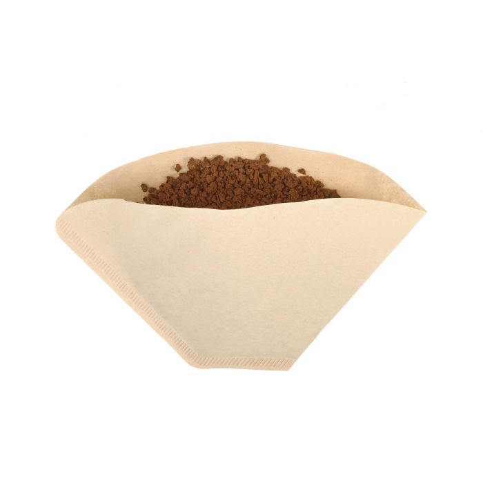 an unbleached number four coffee filter with coffee on a white background