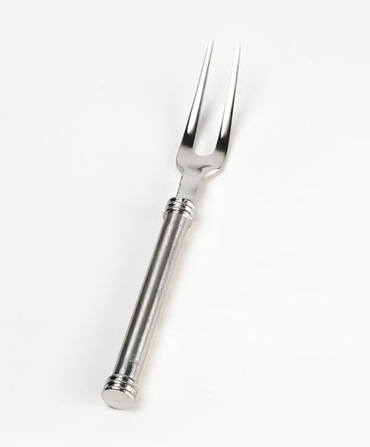 stainless steel 2 prong fork on white background.