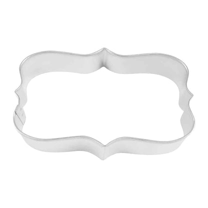 rectangle cookie cutter with flourished points and rounded corners shown on a white background