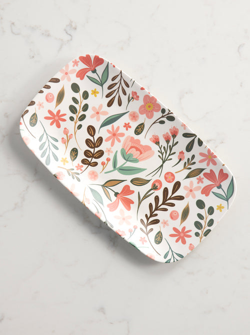 floral tray on a marble background.