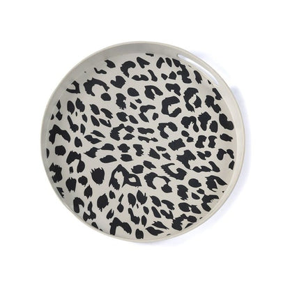top view of cheetah print tray on white background.