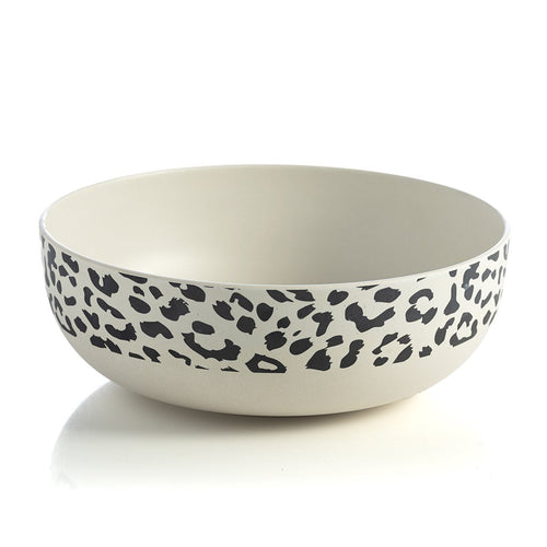 off white bamboo serving bowl with black cheetah print band around upper rim on white background.