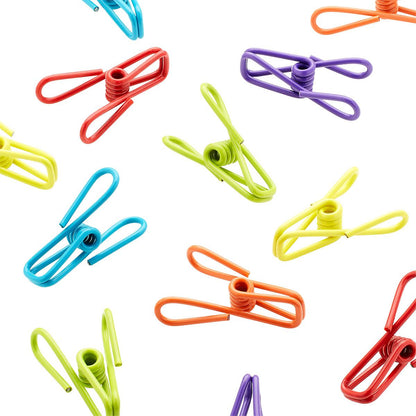 multi purpose clips scattered on a white background