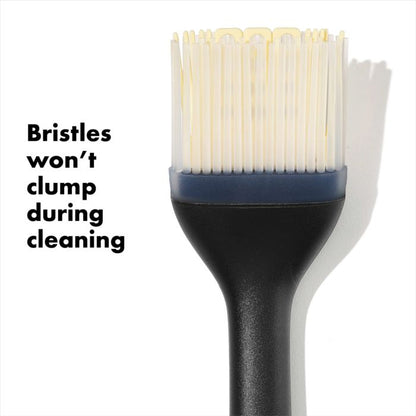 close-up of bristles with text "bristles won't clump during cleaning".