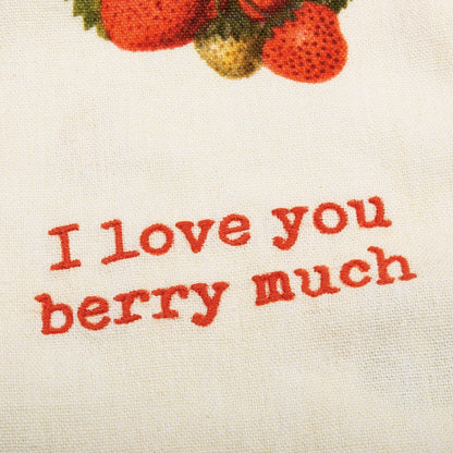 close up view of the text embroidered on the i love you berry much kitchen towel