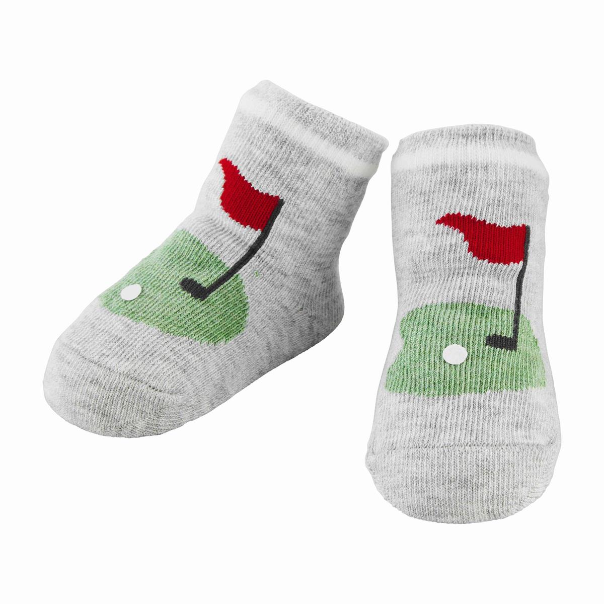 gray socks with putting green on the top on a white background