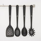 spatula, slotted spoon, spoon, and  pasta fork hanging on utensil bar.