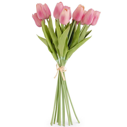 bundle of pink tulips tied with a raffia ribbon.