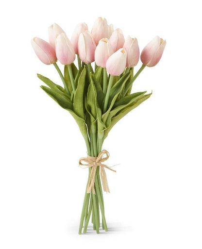 bundle of light pink tulips tied with a raffia ribbon.