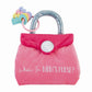 pink purse shaped book with a plastic ring of keys attached to the grey handle.