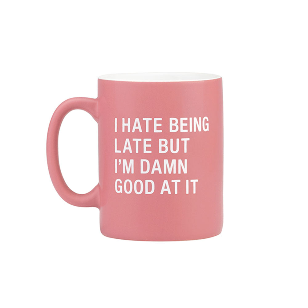 mug with quote "i hate being late but i'm damn good at it" on a white background