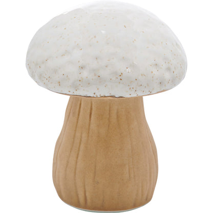 small wild mushroom figurine on a white background