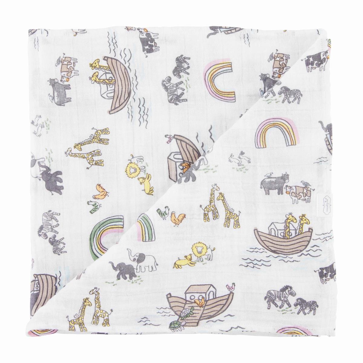 noah's ark swaddle with giraffes and zebras on a white background