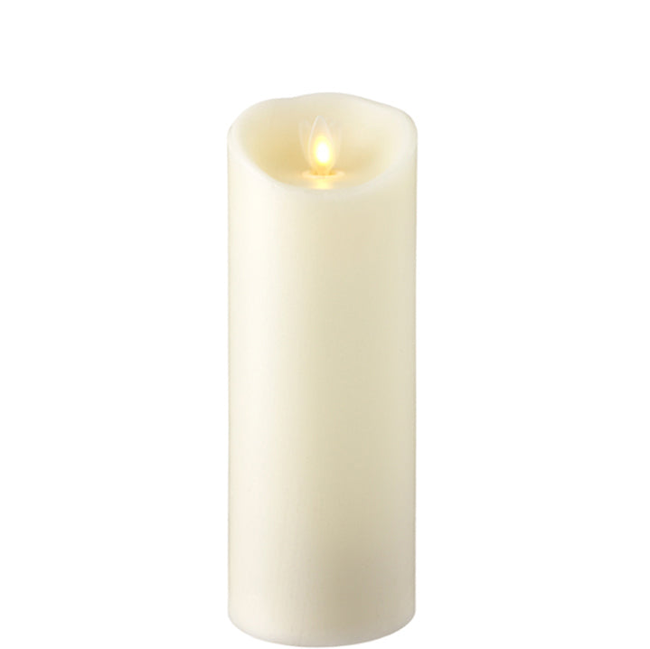 medium moving flame ivory pillar candle displayed against a white background