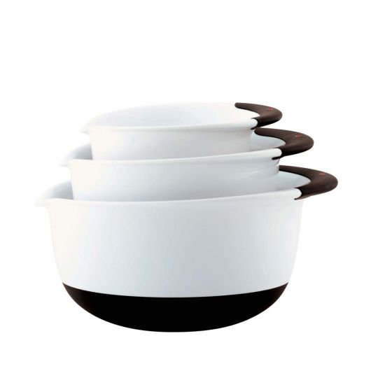 all three sizes of white 3 piece mixing bowls stacked against a white background
