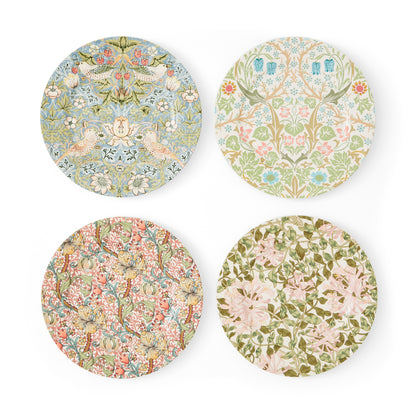 all four patterns of dessert plates displayed on a white background