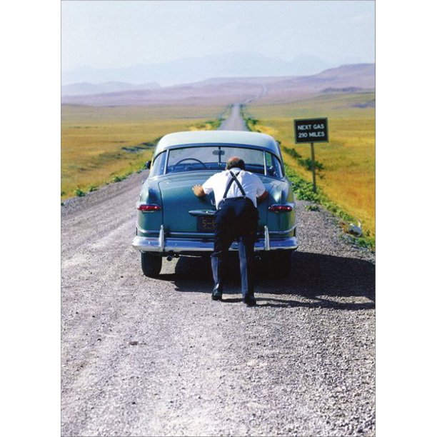 front of card is a photograph of an old man pushing an old car down a gravel road