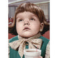 front of card is a photograph of a young girl dressed as an office worker with coffee rolling her eyes