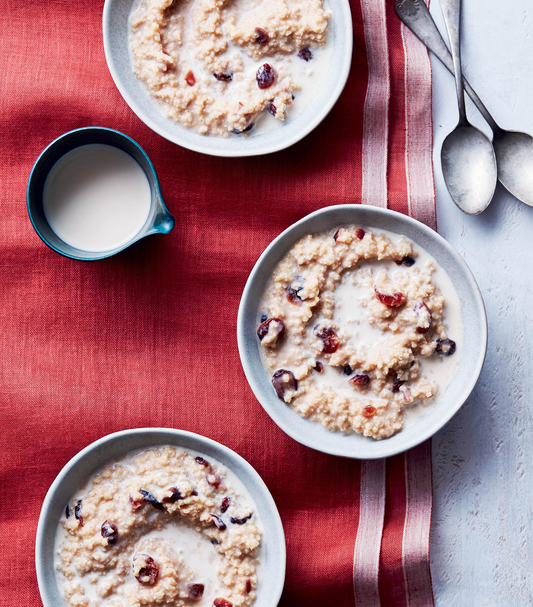 another page with a picture of three bowls of oats on a red table runner