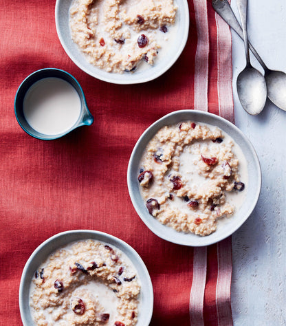 another page with a picture of three bowls of oats on a red table runner