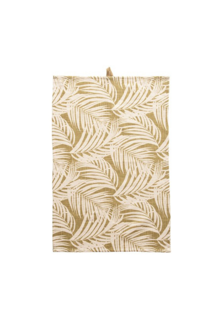 mustard dishtowel with cream palm leaf design.