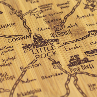 close-up of Little Rock on Arkansas shaped board.