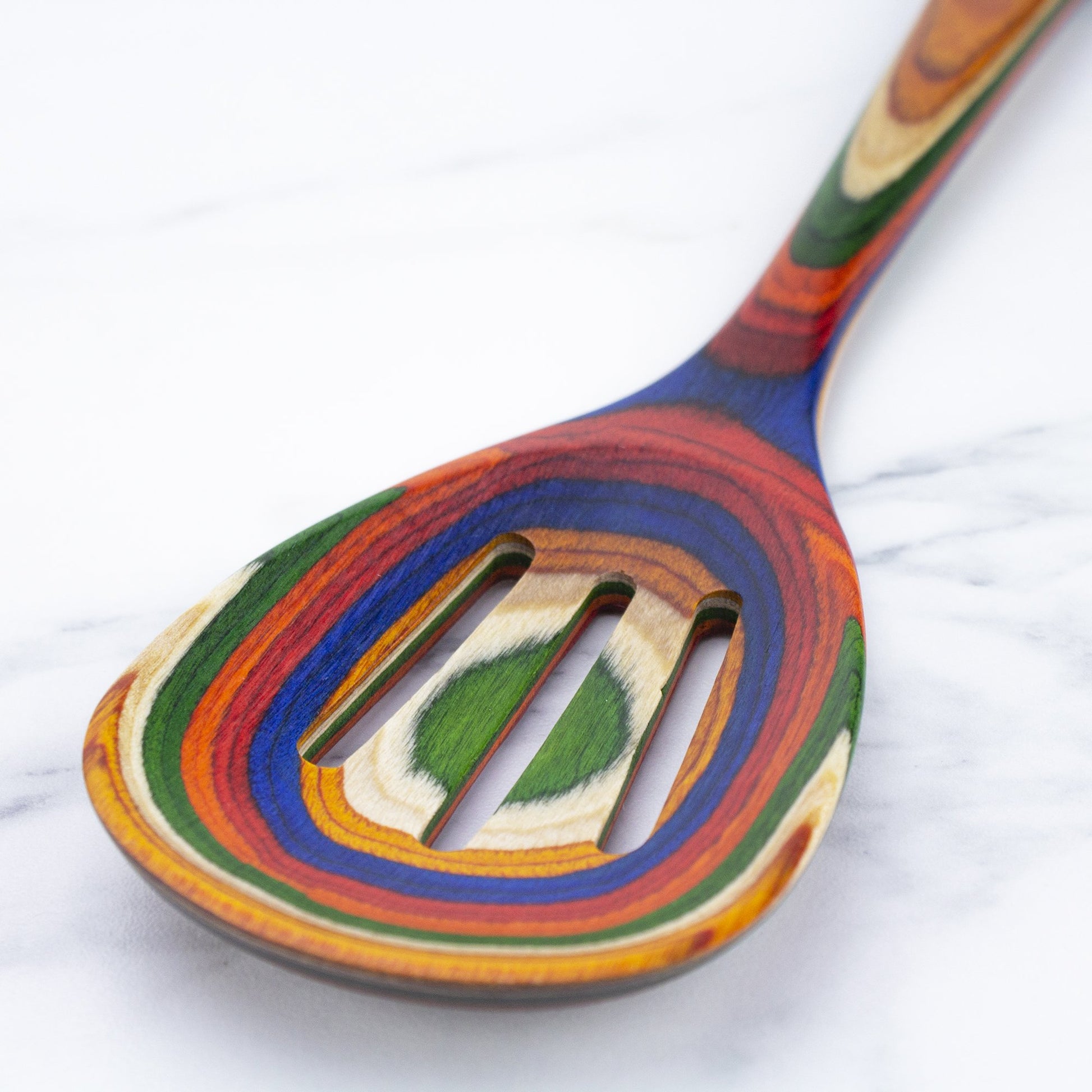 close-up view of spoon on white background.