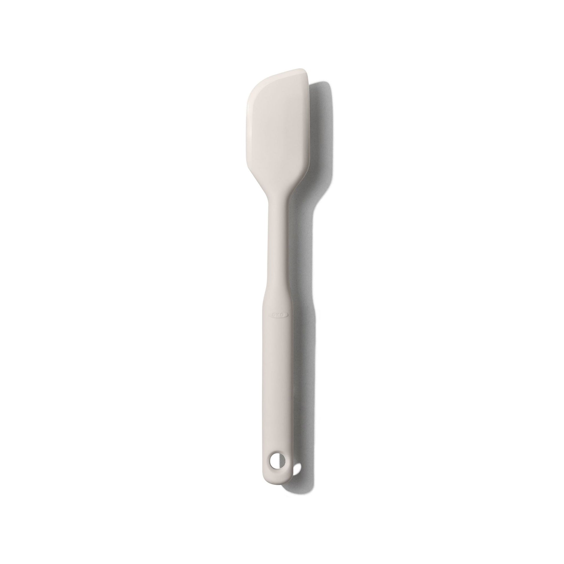 white small silicone spatula displayed on a white background