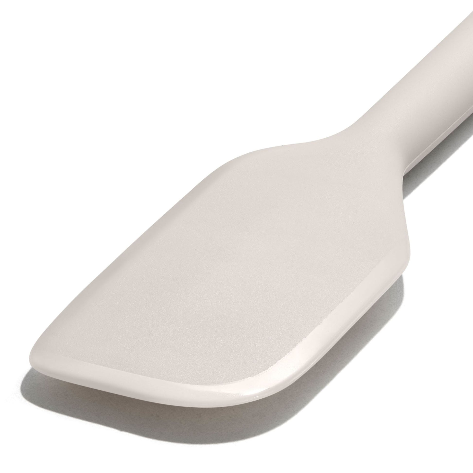 close up view of the spatula end displayed on a white background