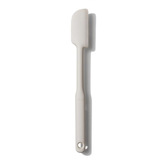 solid white silicone jar spatula on a white background