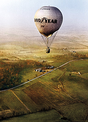 front of card is a photograph of a hot air balloon over a field