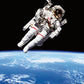 photograph of astronaut floating in space with planet in background