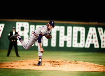 front of card is a photograph of a baseball player pitching with a birthday sign in the background