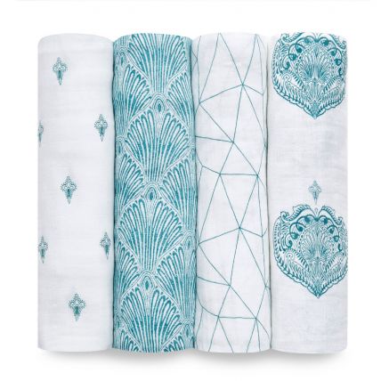 four paisley teal cotton muslin swaddles on a white background 