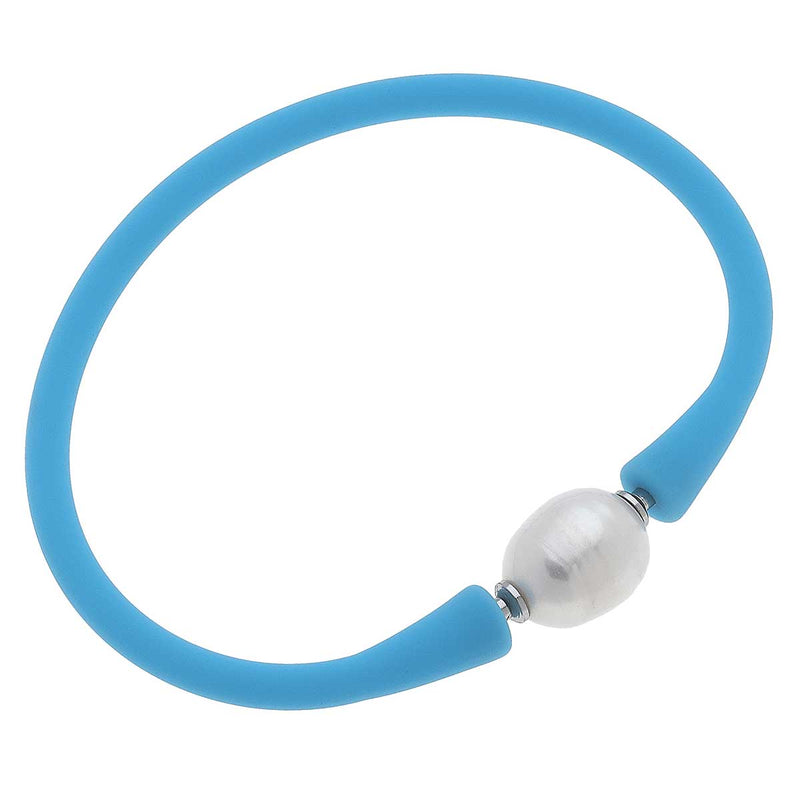 aqua bali freshwater pearl silicone bracelet on a white background