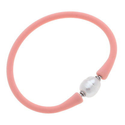 pink bali freshwater pearl silicone bracelet on a white background