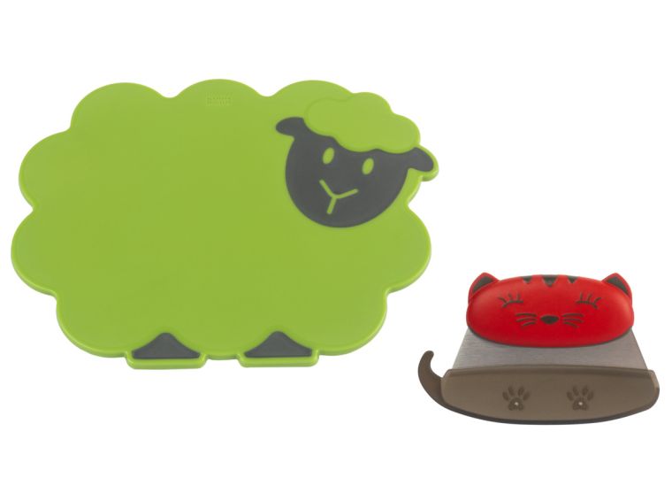 green lamb shaped cutting board and cat shaped knife with sheath on a white background.