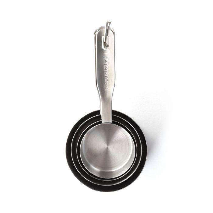 4 Stainless Steel Measuring Cups nested together.