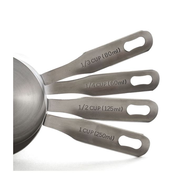 close-up of handles of 4 Stainless Steel Measuring Cups showing the measurements.