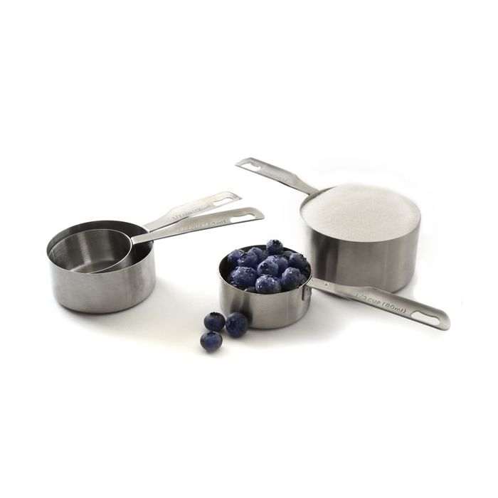 4 Stainless Steel Measuring Cups, 1 filled with sugar, 1 filled with blueberries.