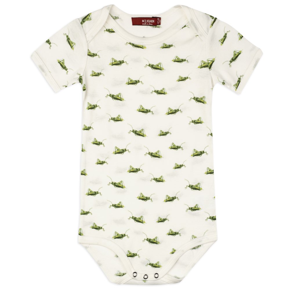 cream onsie with all-over grasshopper pattern.