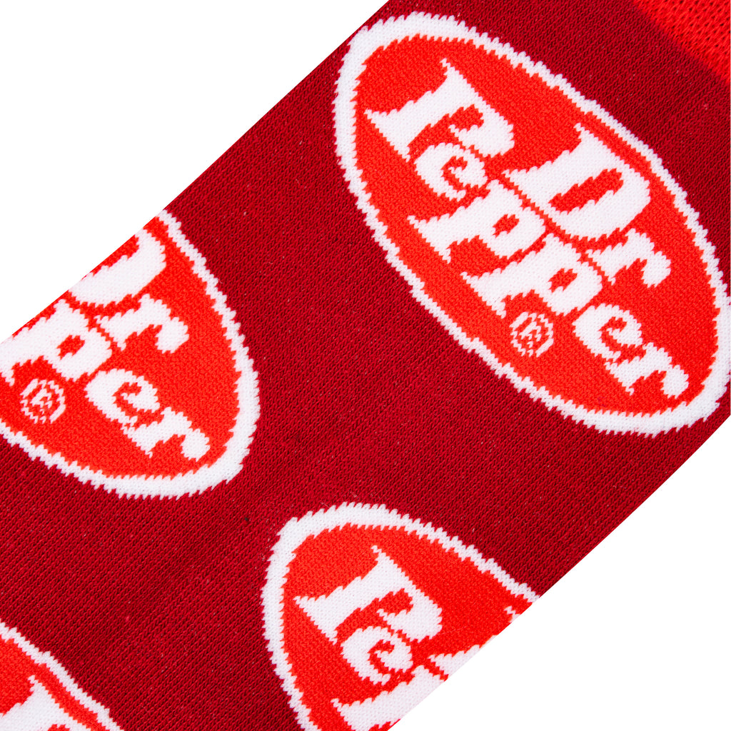 close up view of dr pepper crew socks displayed flat on a white background