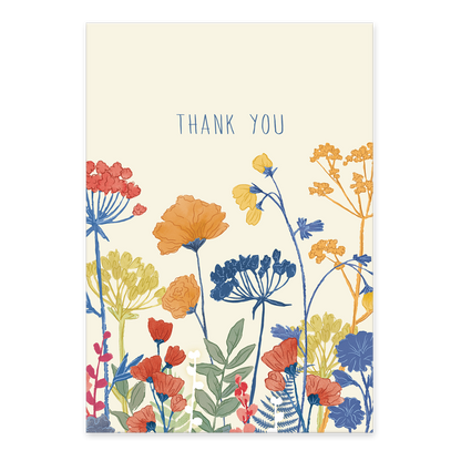 cream colored notecard with floral design and "thank you" printed across the top.