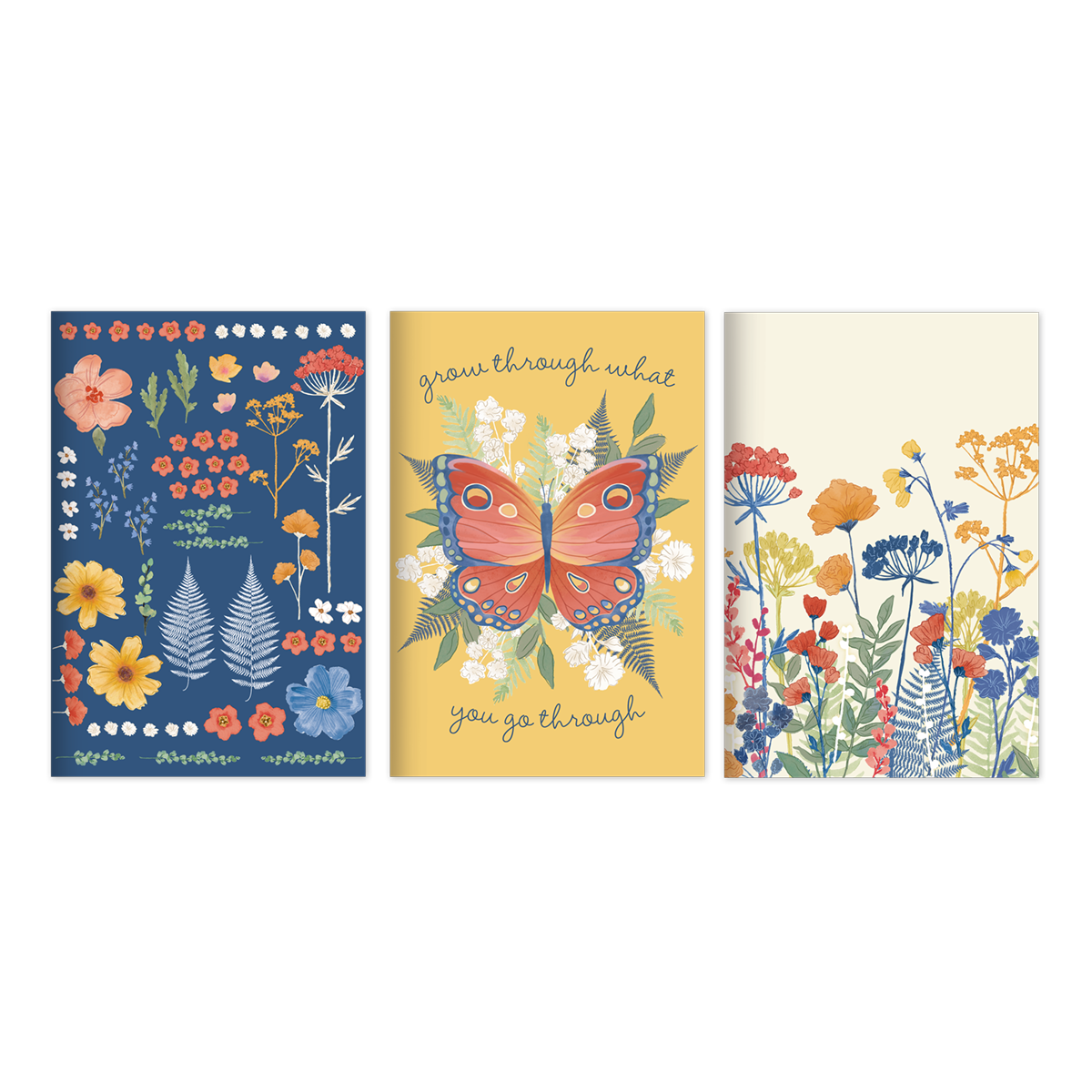 3 notebooks in a row, 1 is blue with floral design, 1 is yellow with butterfly and flowers, 1 is cream with wildflower design.