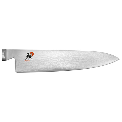 close up of knife blade with logo on white background