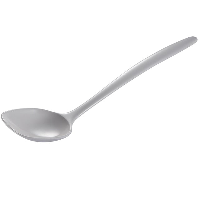 white melamine spoon on a white background