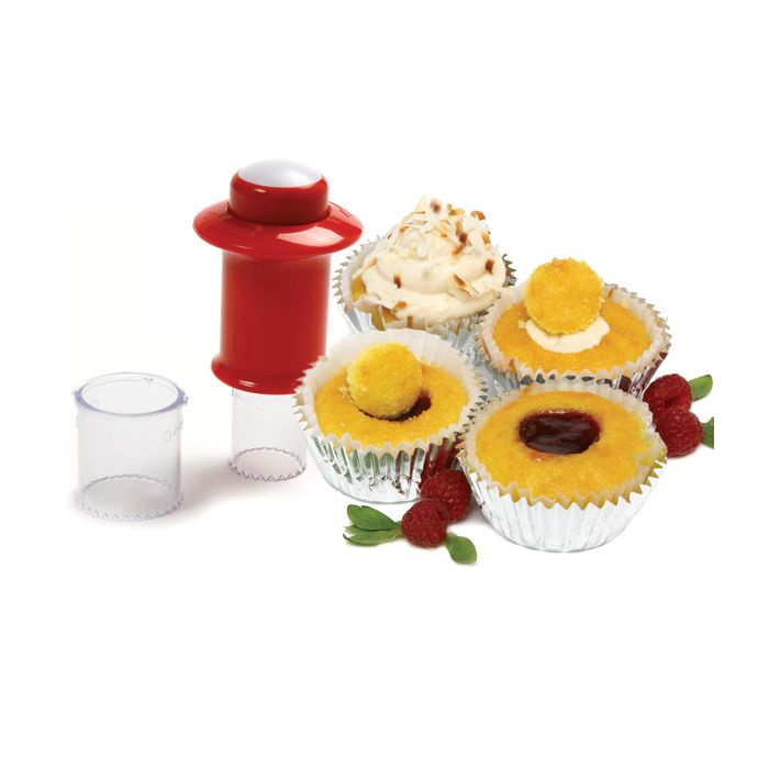 cupcake corer with cupcakes that have been cored and filled.
