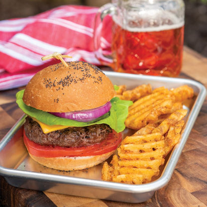 close-up of burger tray with burger and fries on it.